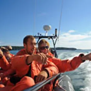 a group of people in a body of water